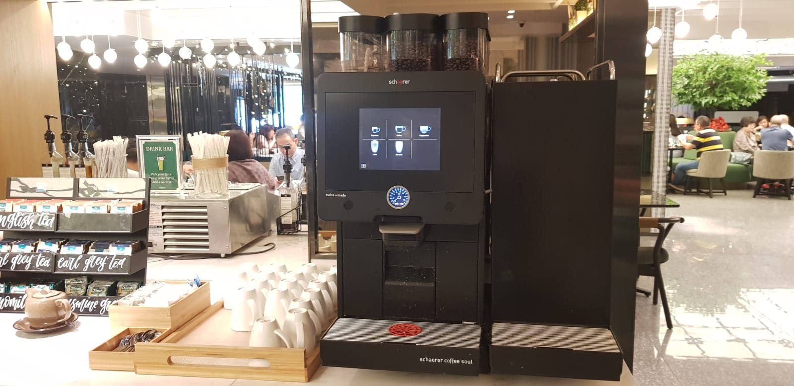 https://www.oncoffeemakers.com/images/Orchard_hotel_lobby_buffet_scharer_coffee_soul_coffee_plus_espresso_machine_3.jpeg